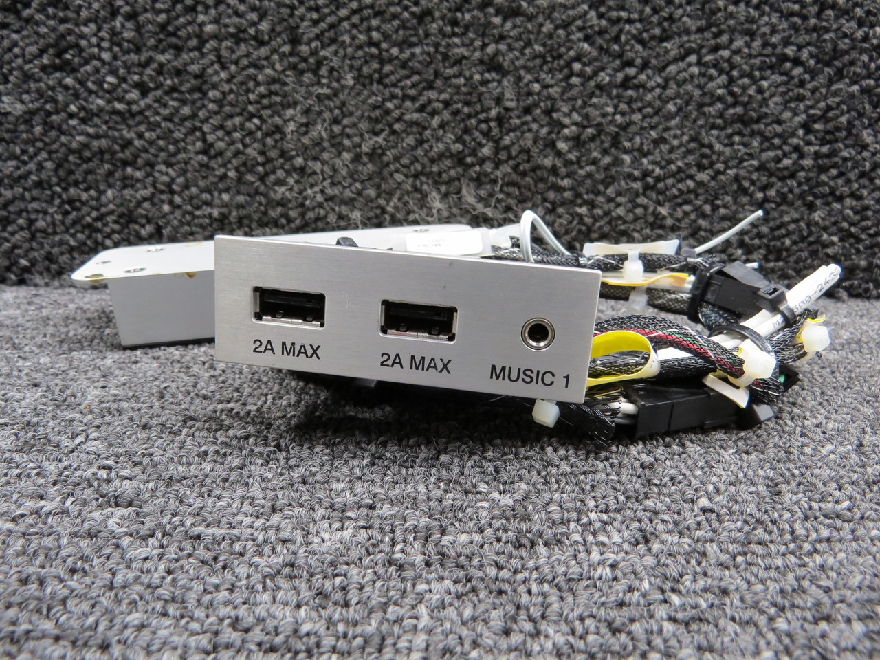 35023-001 (Alt: P5392) Cirrus Vision Jet SF50 Center Console Music Panel Assy